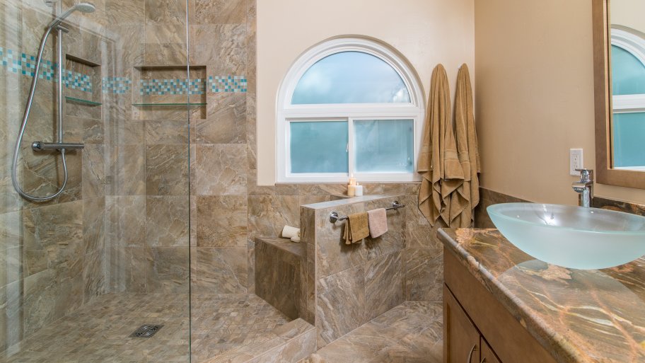 double sink vanity with maple wood cabinets and oregano stain